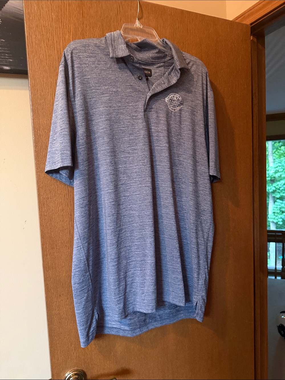 Men's Heather Blue Polo with Subtle Logo - Chase 54